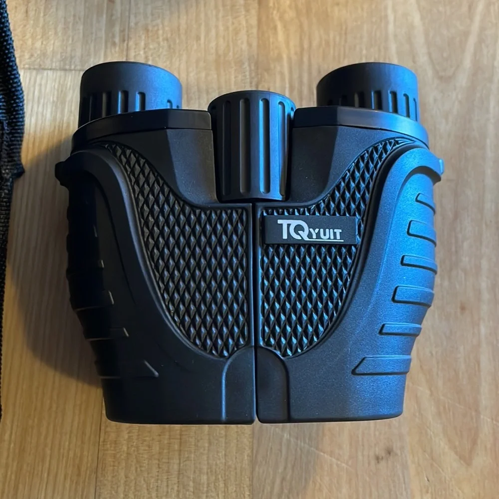 15x25 Binoculars. New. Great for hunting or sports.
